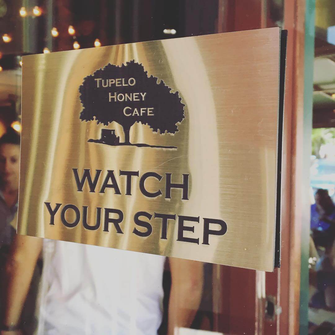 Brass Sign for a Caf? Saying WATCH YOUR STEP