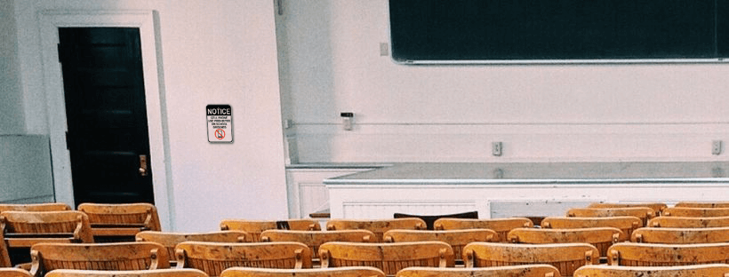Classroom with No Cell Phones Sign by Door