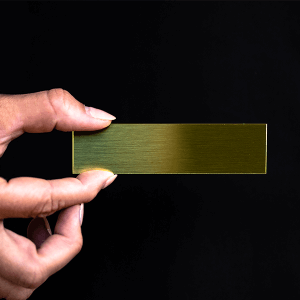 brass sign 1" x 4"