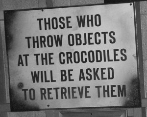 zoo signs throw things