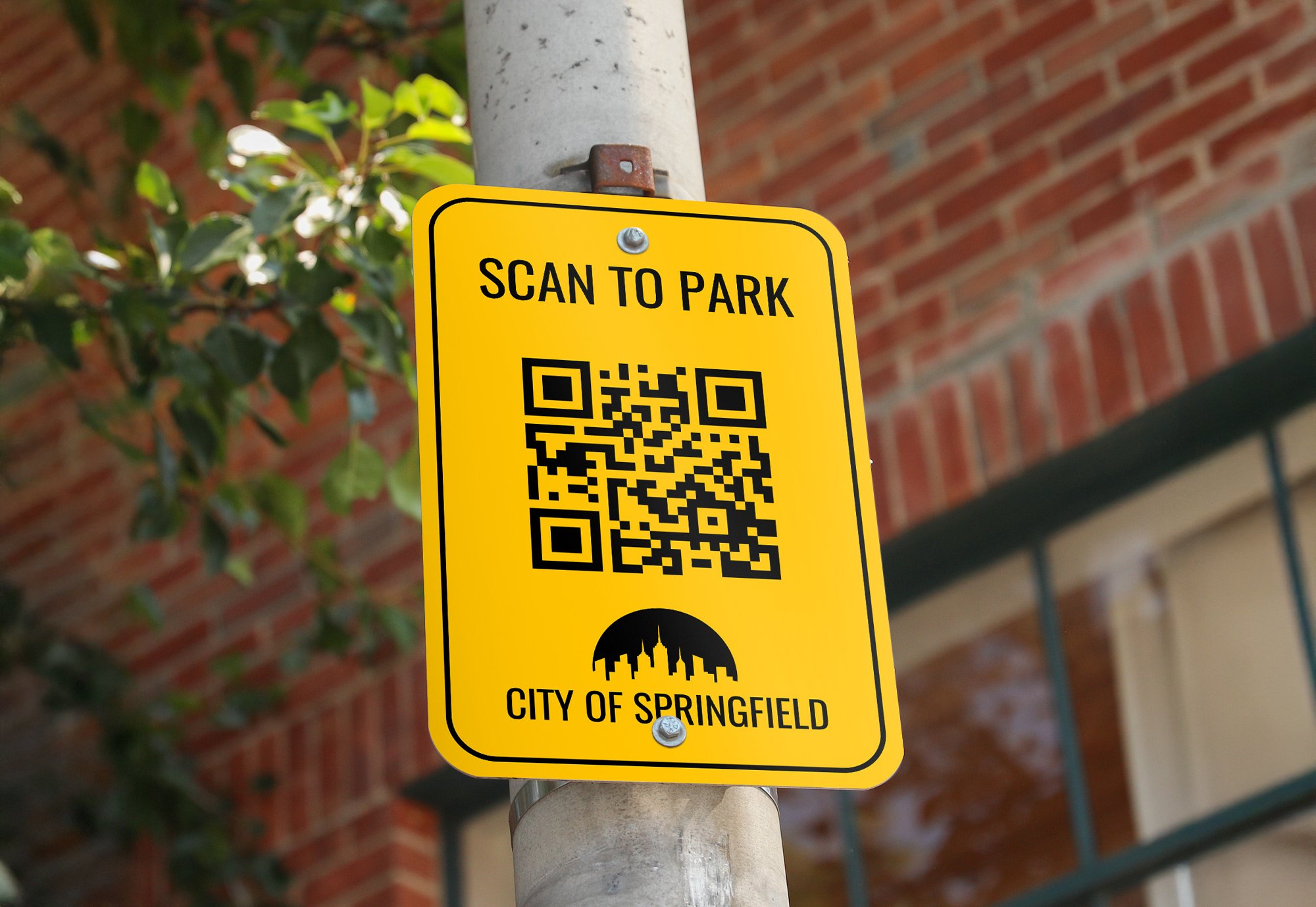 An aluminum parking sign displayed on a pole